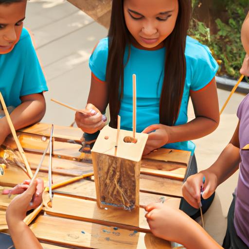 These kids are having a blast making a bird feeder using popsicle sticks and paint.
